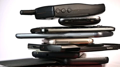 France-April 24, 2019, outdated models of mobile phones and smartphones on turnt 库存影片 106925750