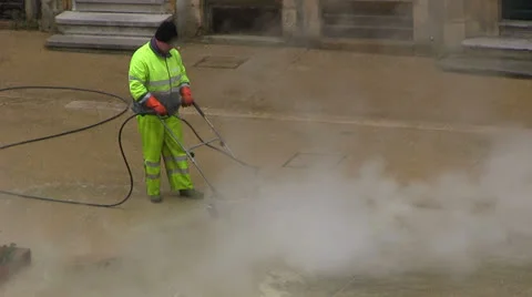France - construction workers with a steam cleaning machine Stock-Footage 24709518