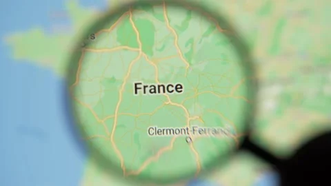 France On a Digital Map Closeup Focus Magnifying Glass Stock Footage 219153355