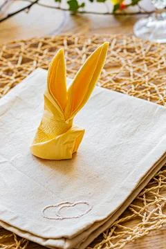 FRANCE-DIJON-EASTER-NAPKIN-FOLDING-RABBIT Stock Photos
