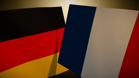 France Flag Rippling In Front Of Germany With Its Shadow Sweeping The Cloth Видео 344705895