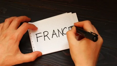 France Hands write a word close-up Stock Footage 105371798