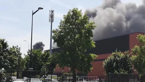 France: Massive Fire Erupts At Textile Warehouse In Aubervilliers 2 Stock Footage 243754619