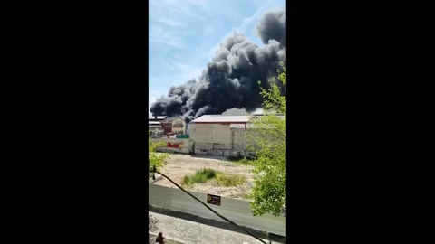 France: Massive Fire Erupts At Textile Warehouse In Aubervilliers 4 Stock Footage 243754698