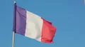 France national flag waving on flagpole on blue sky background HD Footage
