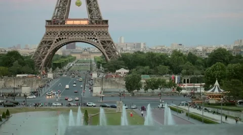 FRANCE, PARIS: Eiffel Tower and fountain at sunset Stock Footage 64919366