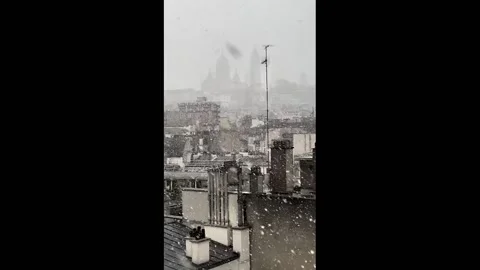 France: Paris Sees First Snowfall Of The Season Stock Footage 292984082
