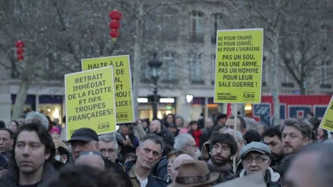 France: Protest held in Paris against US and Israeli attacks in Middle Ea... Stock Footage 330264219