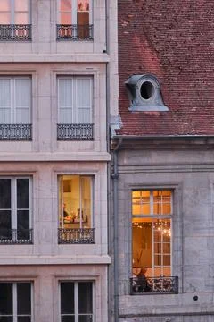 Franch building with lit windows Stock Photos