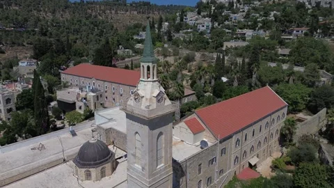 Franciscans catholic Saint John Baptist Church,Ein Karem village,Aerial video Stock Footage 313405917