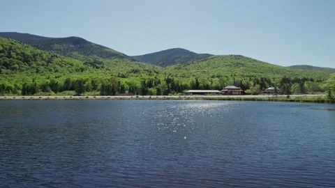 Franconia Notch's Echo Lake forested hills environment and leisure paradise, US Stock-Footage 341070709