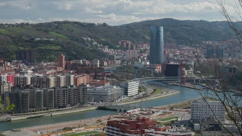 Frank Gehry Bilbao Bridge and the Euskalduna Bridge over the Nervion river Stock Footage 303655949