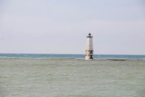 Frankfort Lighthouse with large waves Stock Photos