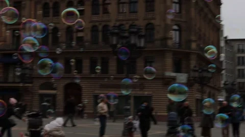 Frankfurt am Main, Hessen, Germany. February 24th 2023. Man is making giant.. Video stock 277571553