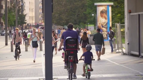 FRANKFURT- GERMANY, AUGUST, 2017: Crowd of people walking and riding bicycle. Stock Footage