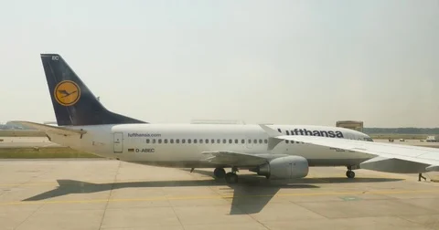 Frankfurt International Airport with Lufthansa Airlines preparing to take-off Stock Footage