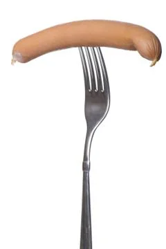 Frankfurter on fork close up Stock Photos