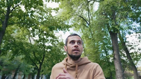 Frantic Man Searching for a Missing Person on Street Stock Footage 312318824