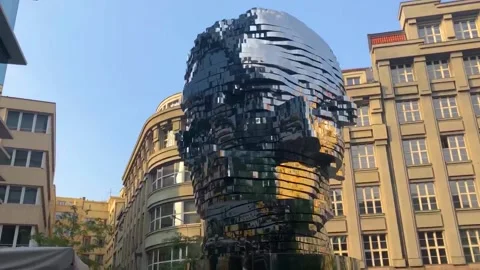 Franz Kafka's head in Prague. Moving sculpture head of franz kafka in prague. Si Stock Footage 154082463