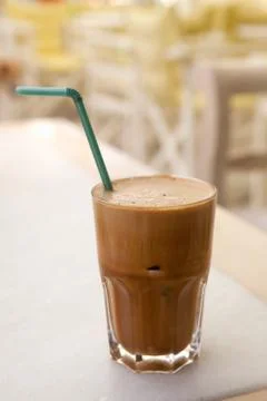 Frappe on a cafe table Stock Photos