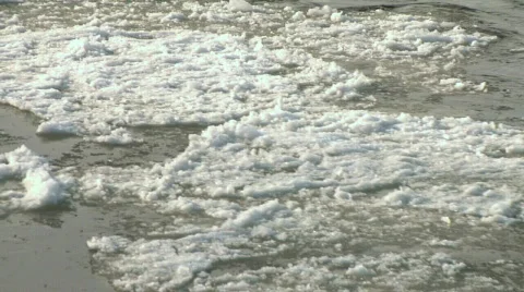 Fraser River CU Ice Flow Pull out Stock Footage 344190
