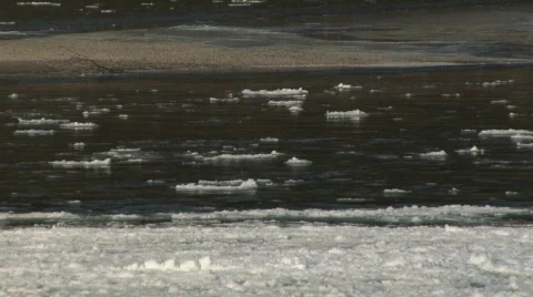 Fraser River Winter Ice CU flow R to L Stock Footage 345742