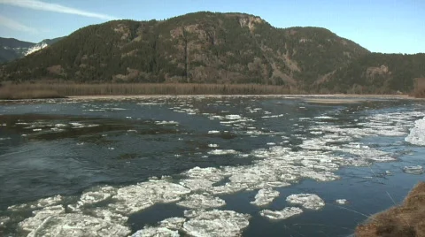 Fraser River WS MT bg winter Ice Stock Footage 345769