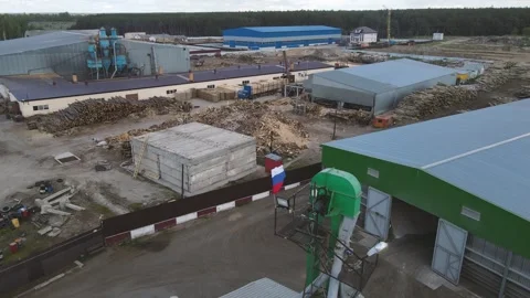 Frash of Russia develops from the wind over an industrial building Stock Footage 280503033