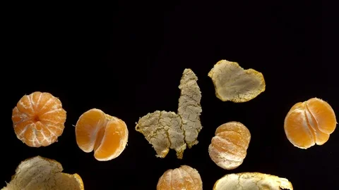 Frash tangerines on black background. Stock Footage 70080743