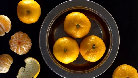 Frash tangerines on black background. Stock Footage 70080822