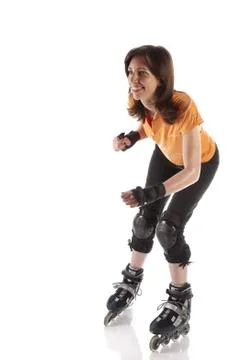 Frau fährt Inline-Skates Stock Photos