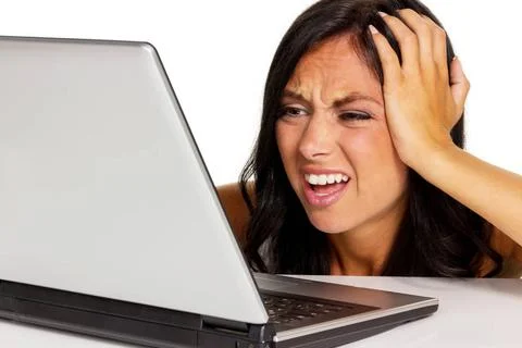  Frau hat Stress am Computer Eine junge Frau hat Stress mit Ihrem Laptop C... Stock-Fotos