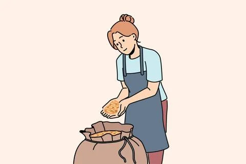 Frau steht neben einem Sack Malz für die Herstellung von Craft Beer und sa.. Stock Photos