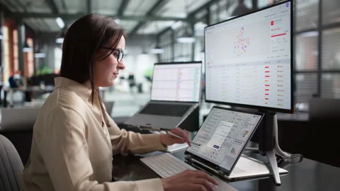 Fraud Analyst Monitors Suspicious Transactions On Laptop Stock Footage 337640848