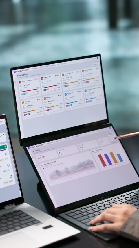 Fraud Analyst Reviews Real-time Transaction Patterns Stock Footage 345330607