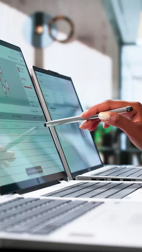 Fraud Analyst Reviews Suspicious Transaction Patterns On Laptop Stock Footage 339912441