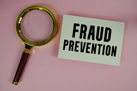 Fraud Prevention text written on paper with magnifying glass 스톡 사진