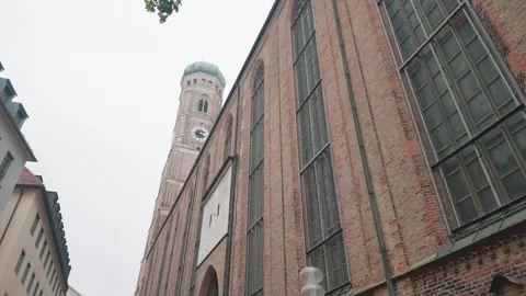 Frauenkirche Tower Above Brick Facade, Munich Old Town Alley Stock Footage 343030091
