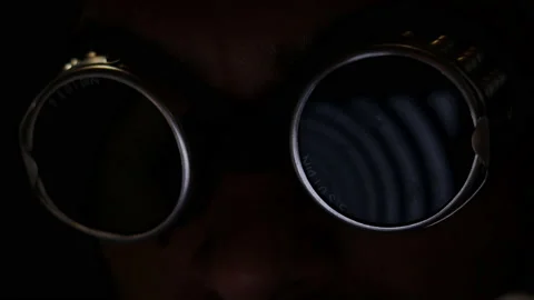 Freak man hypnotized by a spiral hypnotic effect looking at the computer screen. Stock Footage 157925697