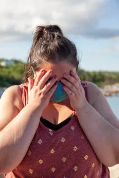 Freaking out with mask on Stock-Fotos