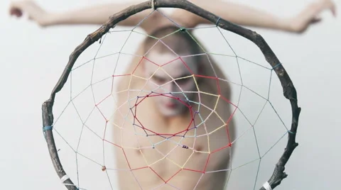 Freaky guy behind the dream catcher Stock Footage 67599479