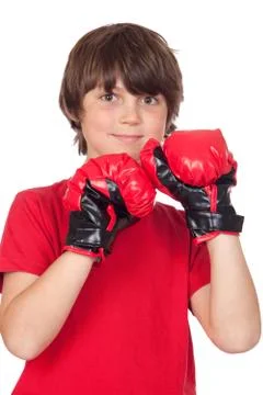 Freckled boy with boxing gloves Foto stock