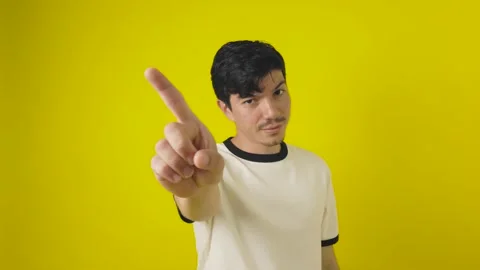 Freckled young man making No gesture with his index finger Stock Footage 311655217