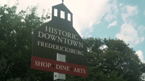 Fredericksburg, Texas - June 15, 2020: sign for Historic Downtown arts distri Stock Footage