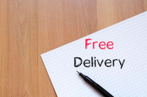 Free delivery text concept on notebook Stock Photos