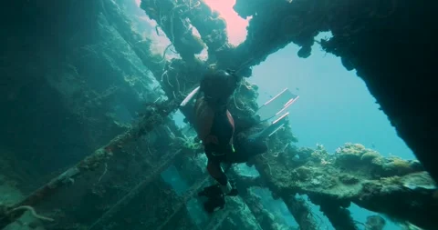 Free Divers Exploring Big Ship Wreck. Stock Footage 265219585