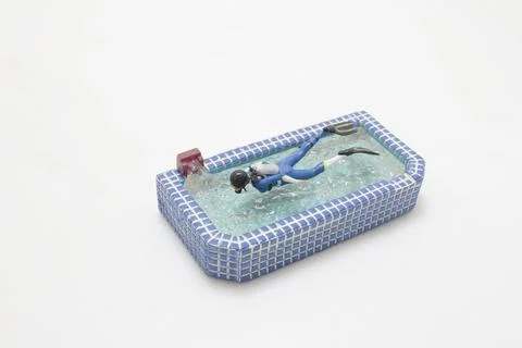 A free diving at the bath pool Stock Photos