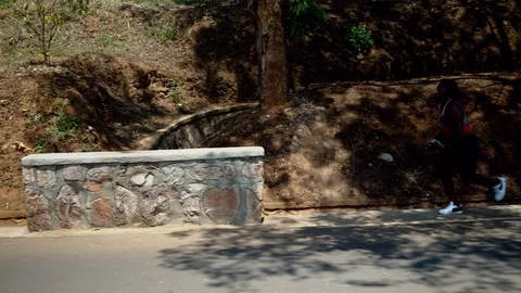 Free runner african man doing tricks at street Stock Footage 117689153