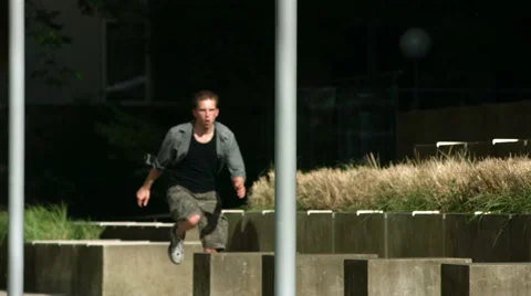 Free runner leaps across concrete blocks, slow motion Stock-Footage 62280345