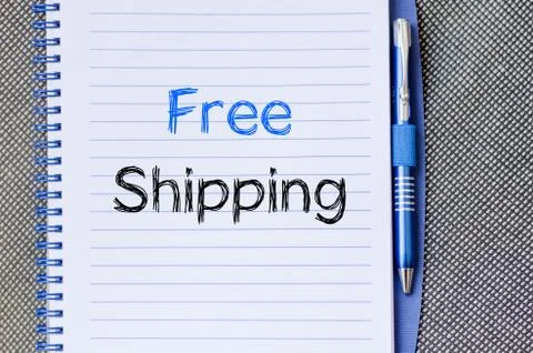 Free shipping text concept on notebook Stock Photos